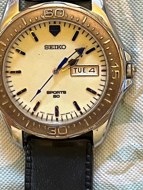 Seiko Quartz Day Date Stainless Steel Water Resistant 5 Bar Sport