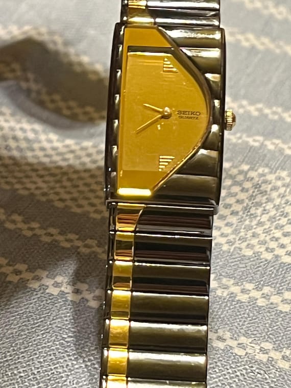 SEIKO Black and Gold Half Moon Ladies Watch Case Number 2y00