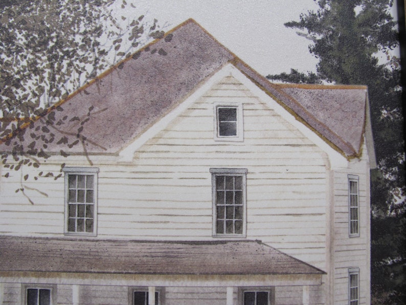 May include: A white clapboard house with a brown roof and multiple windows. The house has a porch with a railing and a small tree in the background.