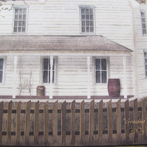 May include: A white farmhouse with a porch and a wooden fence. The house has a brown roof and windows. There is a barrel on the porch and a chair. The text "Grandma's House" is written on the fence.