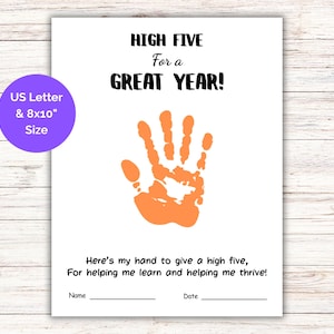May include: White paper with the text "HIGH FIVE For a GREAT YEAR!" and an orange handprint. The text "Here's my hand to give a high five, For helping me learn and helping me thrive!" is also included. The paper is US Letter & 8x10" size.
