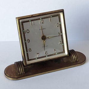 Orologio da tavolo con sveglia a otto giorni Florn Germania con lancette luminose non funzionante *LEGGI