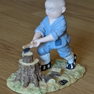 Chinese Young Shaolin Monk Statue Figurine Chopping Wood Resin