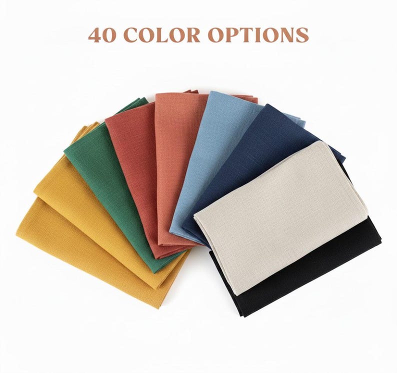 May include: A collection of folded fabric napkins in various colors, including yellow, green, red, blue, and black. The text "40 COLOR OPTIONS" is displayed at the top of the image.