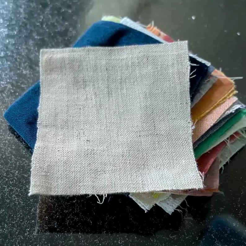 Handmade European linen color swatch pack featuring 100% GOTS certified natural fabric samples. This eco-friendly set includes a variety of shades, allowing you to see and feel the true texture and color before ordering curtains, pillow covers, table linens, or other home textiles. Pre-washed, sustainable, and hypoallergenic linen ensures durability, timeless beauty, and confidence in choosing the perfect color match for your space.