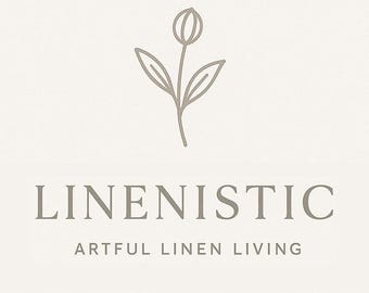 May include: A logo with the word "LINENISTIC" in a serif font, with the tagline "ARTFUL LINEN LIVING" below. Above the text is a simple line drawing of a flower. The background is a light beige color.