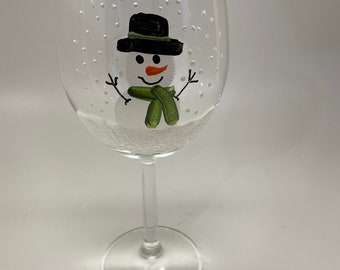 Hand Painted Snowman Wine glass with green scarf and hat available in two sizes