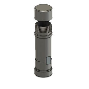 May include: A gray cylindrical container with a removable lid. The container has a small rectangular window on the side.
