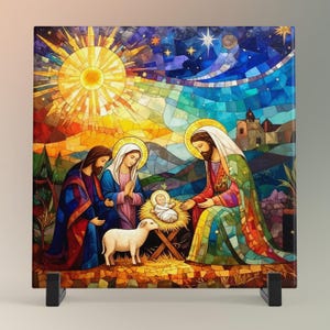May include: A square, stained-glass style artwork depicting the Nativity scene. The artwork features Mary, Joseph, and baby Jesus, with a lamb in the foreground. The background includes a vibrant sun, stars, and a church.
