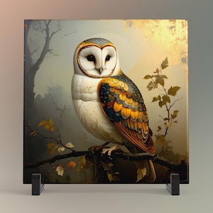 May include: Square ceramic tile featuring a detailed illustration of a barn owl perched on a branch. The owl has white, brown, and yellow feathers, with a serene expression. The background includes a soft, golden light and a tree.
