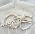 Cream Bridesmaid Proposal Gift | Bridesmaid Bracelet | Maid of Honour Jewellery Pouch | Personalised Bridal Gift | Personalised Bracelet product logo