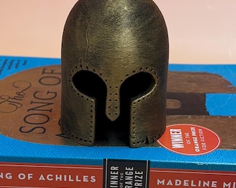Achilles helmet shelf decor