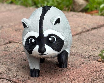 Jimothy the raccoon figurine (viral Seattle trash panda)