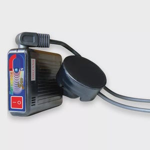 May include: A black and gray electronic device with the text "Magneton S Duo" and "Volcano". The device has a red and white power button and a circular black component connected by a gray cable.