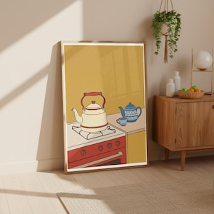 Puede incluir: Ilustración enmarcada de una escena de cocina con una tetera crema sobre una estufa roja. Una tetera y una taza azules están sobre una encimera amarilla. El fondo es de color amarillo liso.