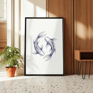 May include: Framed art print featuring two koi fish in a circular design. The fish are depicted in a detailed, blue line drawing against a white background. The artwork is encased in a black frame, suitable for home decor.