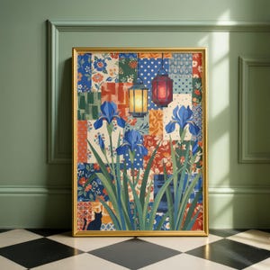May include: A framed art print featuring a patchwork design with blue irises, green leaves, and hanging lanterns. The background is a mix of floral and polka dot patterns in various colors. A black cat silhouette is visible.