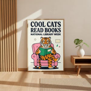 The image is a poster for National Library Week, featuring a cartoon tiger sitting in a pink chair and reading a book.