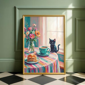 May include: A framed painting depicts a vibrant breakfast scene. A stack of pancakes, a cup of coffee, and a vase of flowers sit on a striped table. A black cat sits near a window, adding a touch of whimsy to the colorful artwork.