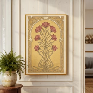 May include: A framed art print featuring a stylized floral design in the Art Nouveau style. The artwork showcases a central arrangement of pink flowers with flowing stems against a yellow background, framed in gold.