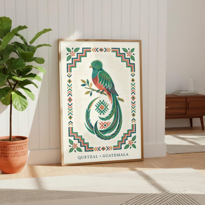 a framed poster of a colorful bird, likely a quetzal, with a decorative border and text that reads "Quetzal - Guatemala".