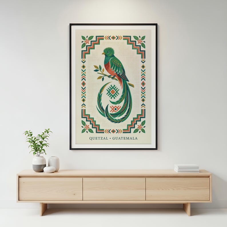 a framed poster of a colorful bird, likely a quetzal, hanging on a wall above a wooden entertainment center.