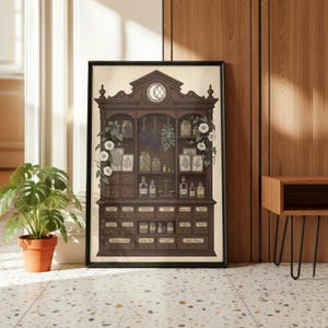 May include: A framed print depicting a vintage apothecary cabinet. The dark brown cabinet is filled with jars, bottles, and drawers labelled with botanical names. Floral and herbal elements decorate the cabinet, with a moon-shaped design at the top.