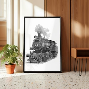 May include: Black and white framed print of a vintage steam train. The detailed illustration shows the locomotive with billowing smoke, set against a white background. The framed artwork is displayed on a wall, adding a touch of classic transportation art.