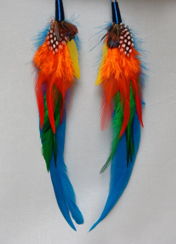 Items similar to Extra Long Tribal Orange and Blue Feather Earrings on Etsy