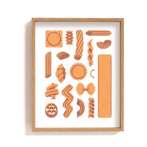 May include: A white framed print with an illustration of various types of pasta in orange and red. The pasta shapes include penne, rigatoni, farfalle, and spaghetti.