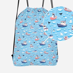 May include: A blue drawstring bag with a pattern of white icebergs, penguins, and red and blue fishing boats.