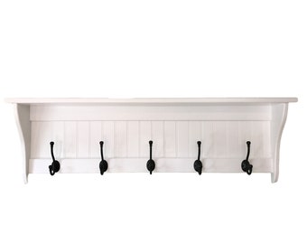 Perchero de pared con estante: organizador para entrada y pasillo.