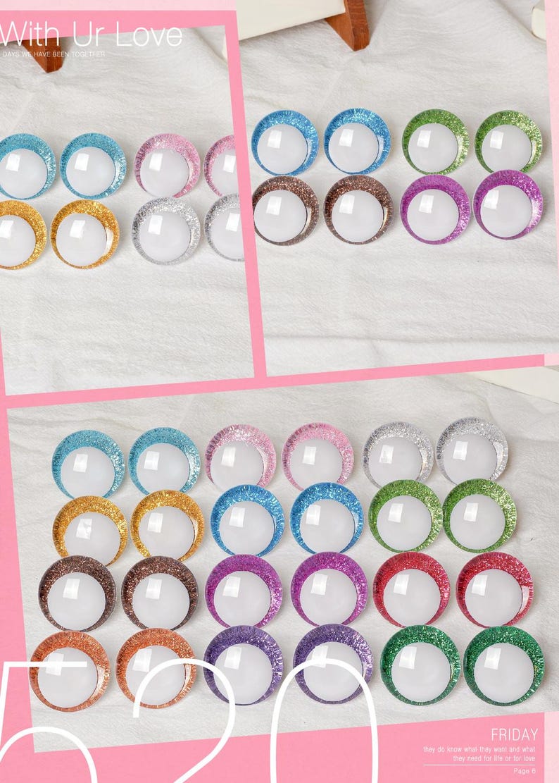 May include: Arrangement of colorful, glitter-rimmed craft embellishments in various colors, including blue, gold, pink, silver, brown, purple, green, and red. The text "With Ur Love" and "FRIDAY" are visible.