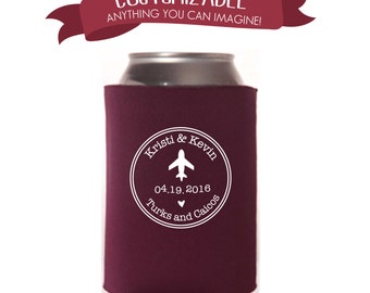 May include: Burgundy can cooler with a white circle design. The circle features the text "Kristi & Kevin", a small airplane icon, the date "04.19.2016", a heart, and the text "Turks and Caicos".