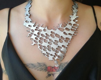 Filigree laser cut leather bib necklace, Silver color necklace with reptile scales texture design, Innovative festive bohemian set jewelry