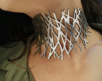 Silver Leather Choquer - Edgy elegance with metal color laser-cut design. Boho chic statement jewelry for a unique and bold look