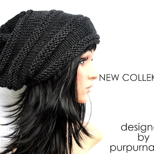 May include: A black knit beanie hat with a textured design. The hat is slouchy and oversized. The text "NEW COLLECTION!" and "designed by purpurnaddel" are visible.