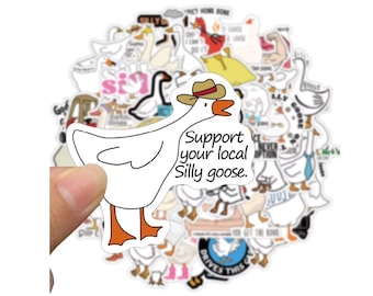 May include: A collection of vinyl stickers featuring various cartoon goose illustrations. One prominent sticker shows a white goose wearing a brown hat with the text Support your local Silly goose. Other stickers depict geese in different poses and outfits.