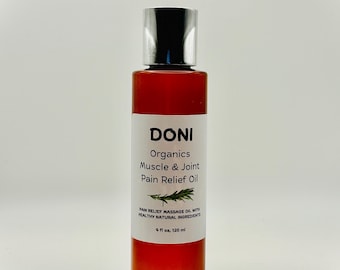 May include: A cylindrical amber glass bottle containing massage oil with a silver cap. The white label reads DONI Organics Muscle & Joint Pain Relief Oil, features a green herb graphic, and states 4 fl oz, 120 ml of product volume.