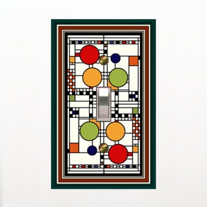 May include: A light switch cover with a geometric design featuring circles in red, orange, green, and blue. The design is reminiscent of stained glass.