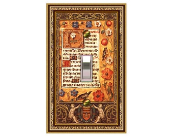 May include: A light switch cover with a vintage design featuring a floral pattern, a medieval-style text, and two cherubs holding a shield. The text reads "M Tona m adulto 1141113 meum mende Domme ad адшиандиعс na.fo Launto quondam the Frendo for atri grace mater mladie".