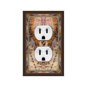 May include: A decorative outlet cover with a brown frame and a vintage map design. The cover has two standard electrical outlets.