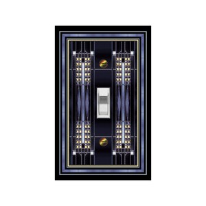 May include: A black light switch cover with a decorative design featuring geometric shapes in shades of blue and gold.