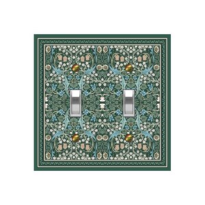 May include: A double light switch cover with a green background and a floral pattern in shades of blue, white, and green. The switch cover has two silver toggle switches.