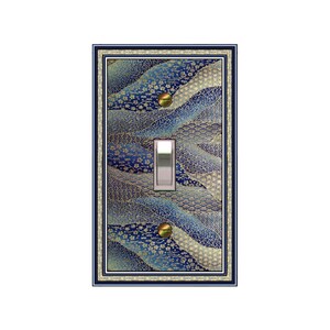 May include: A light switch cover with a blue and gold Japanese-inspired pattern. The pattern features waves, flowers, and geometric shapes.
