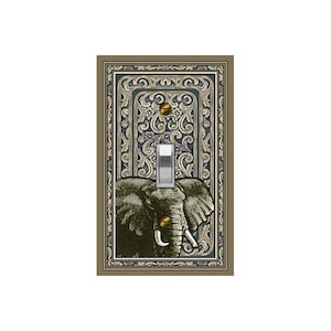 May include: A light switch cover with a decorative design featuring an elephant illustration in a vintage style. The background is a blue and gold patterned design with a decorative border.