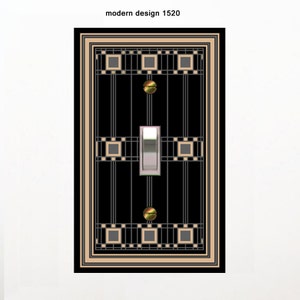 May include: A black and beige light switch cover with a geometric pattern. The switch is silver and the screws are gold.