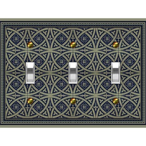 May include: A decorative light switch plate with a blue and gold geometric pattern. The plate has three toggle switches.