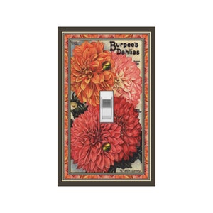 May include: A vintage-style light switch plate featuring a floral design with three dahlias in shades of orange and pink. The text "Burpee's Dahlias" is printed at the top of the plate.