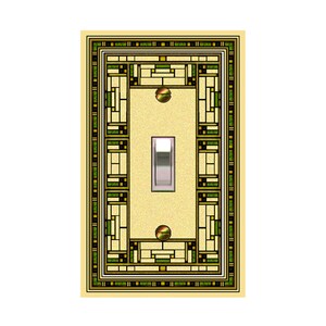 May include: A light switch cover with a decorative design featuring geometric shapes in shades of green, brown, and gold. The design is reminiscent of stained glass.